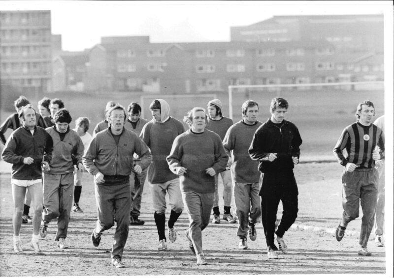 Photograph of Manchester sprinter Danny Herman training the Manchester City team. He trained the football team from 1967-1972 trying to improve their running.